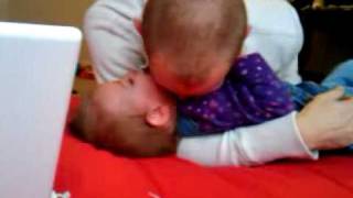 Payton being tickled on the fouton