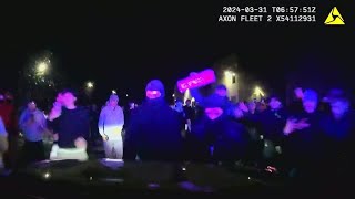 Video shows crowd in 'street takeover' swarming police cruiser in Virginia