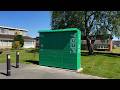 Residents outraged after bright green parcel locker built on quiet cul-de-sac | SWNS