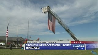 Thousands line processional route in honor of Officer Ellis