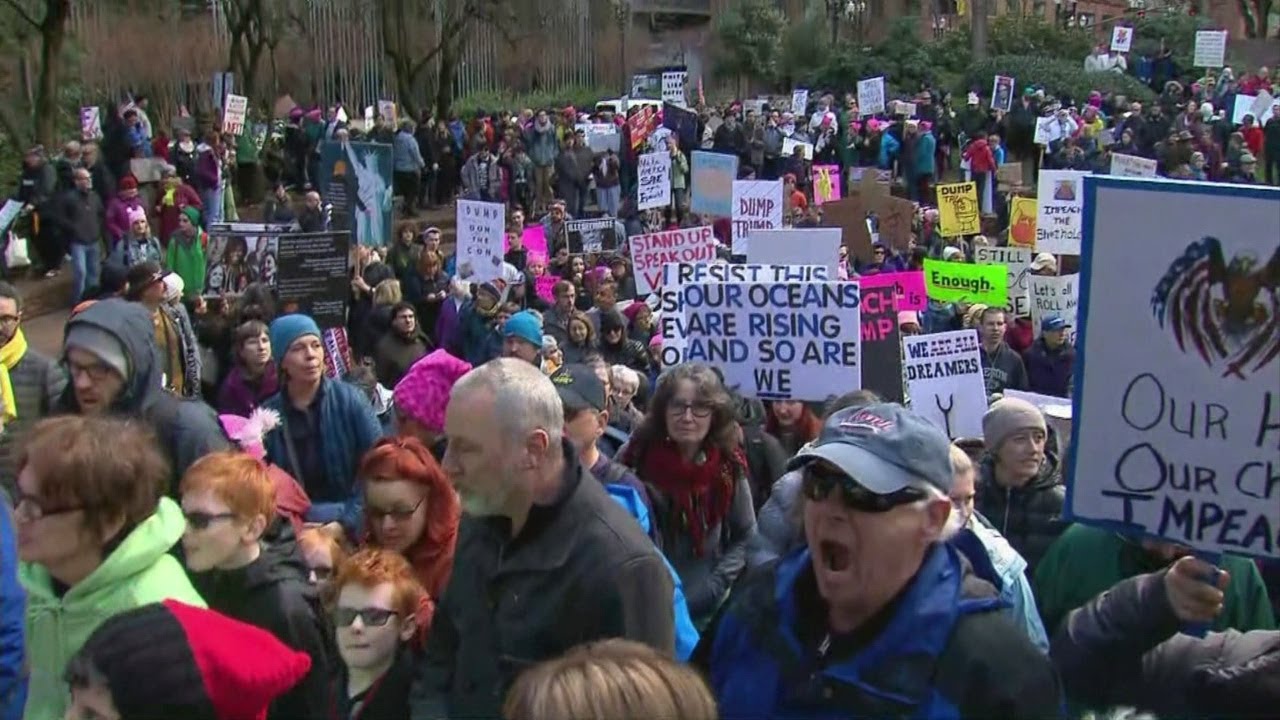 Rallies and marches mark anniversary of Trump's inauguration