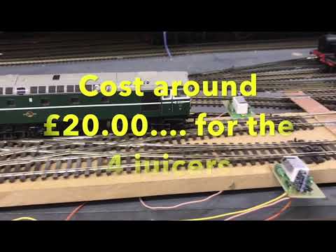 OO gauge scissor crossover using gaugemaster frog juicers