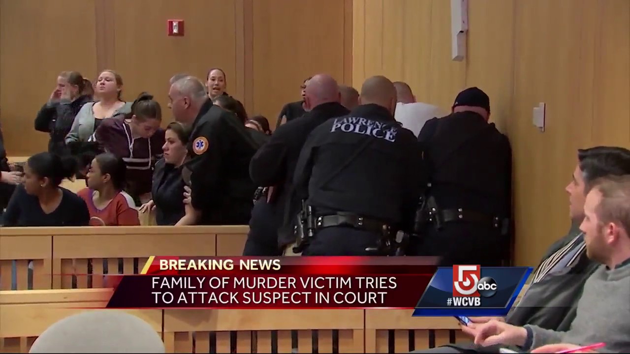 Murder victim's relative lunges at suspect in courtroom melee