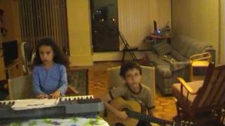 Youssef and Noor playing Au Claire de la Lune Piano and Guitar 2011 10 11 19 52 55