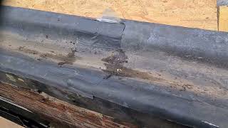 lead gutter leaking, no rear upstand under slates, joints sealed with lead seal, never going to work