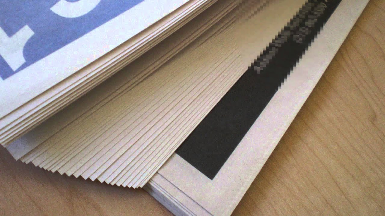 Flipping Newspaper Pages Sound Effect