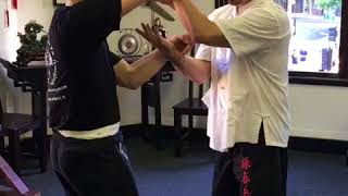 Sifu teaches double arm Chi sao (Sticky hand) drill.