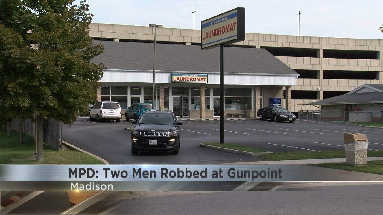 MPD: Two men robbed at gunpoint - YouTube