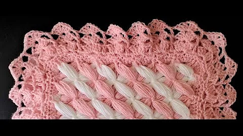 Pom Pom blanket. Crochet a border  Add a beautiful...