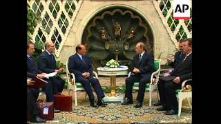 Putin meets Berlusconi, comments on Iraq