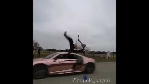 Guy trys to flip over audi R8