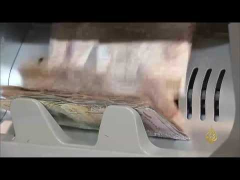 الريال القطري يستعيد قيمته أمام الدولار