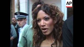 Celebrity Traci Bingham in animal rights bikini picket Net Worth