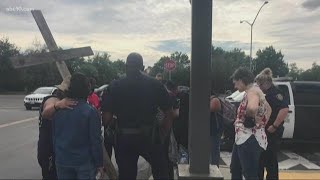 Protesters, police officers join in prayer circle during George Floyd protests in Tracy