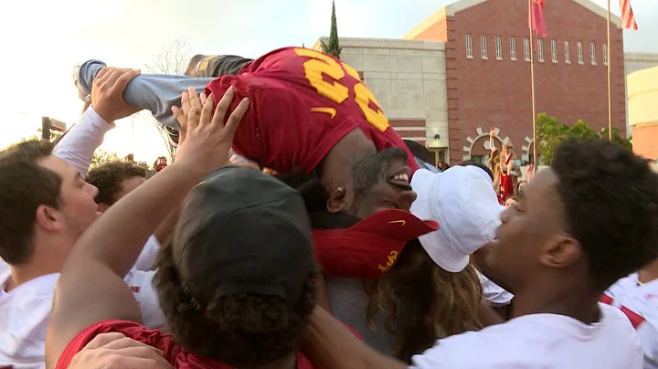 2017 Rose Bowl: Mother of USC senior Leon McQuay III enjoys son being lifted at pep rally
