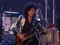 Queen perform "We Will Rock You" at the 2001 Rock & Roll Hall of Fame Ceremony