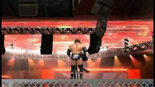 SvR 2011 Superkick on the top of the cell through a table