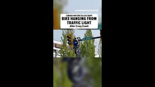 Motorcycle Hanging From Traffic Light After Canada Crash, See the Video!