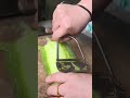 making a neat small circle pattern on a grey concrete wall surface using an industrial iron mold
