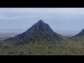 Exploring volcanic cones of Hnúkar, Selvogsheiði shield volcano, Iceland.