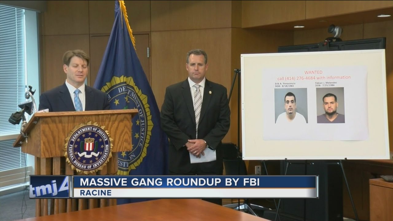 FBI announces arrests of 28 in crackdown on violent gang - YouTube