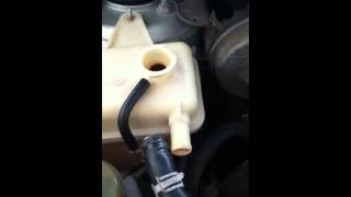 How to remove/replace a Mazda mpv Coolant Tank, diy