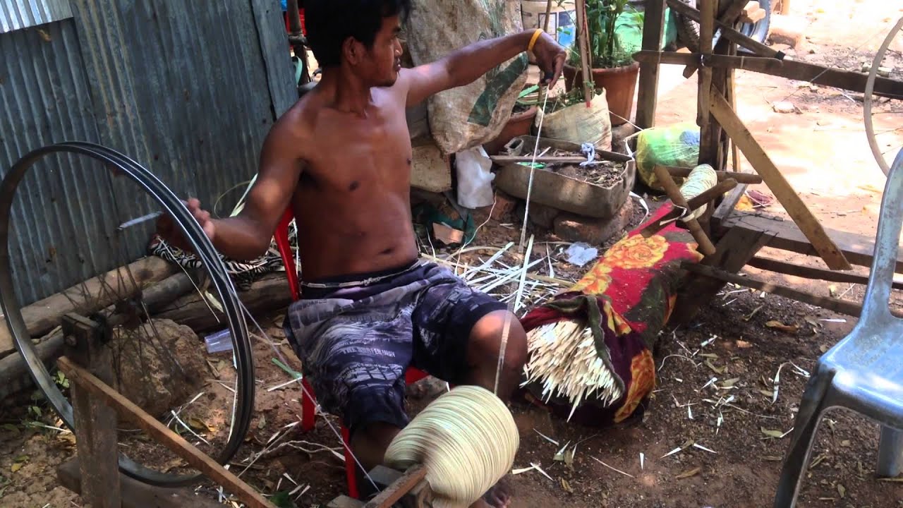 Making cord from palm fronds for basket-weaving