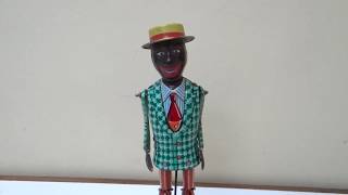 50s HAJI BATTERY OPERATED TIN STRUTTING SAM TAP DANCER JAPAN WORKING
TIN BATTERY OPERATED STRUTTING SAM ( TAP DANCER), MADE IN JAPAN BY HAJI IN VERY GOOD USED CONDITION , THIS ITEM IS FULL OPERATED (SEE VIDEOCLIP), SAM IS MADE ALL OF TIN, THE BATTERY COMPARTMENT LOOKS VERY GOOD, THE ONLY ISSUE I CAN SEE IS THAT THE TOY BASE HAS SOME SIGN OF SURFACE RUST (SEE PHOTO). THIS ITEM IS 60 ++ YEARS OLD AND IT HAS BEEN USED FOR THIS REASON THERE ARE SOME SCRATCHES AND PAINT LOSS. 50s HAJI BATTERY OPERATED TIN STRUTTING SAM TAP DANCER JAPAN WORKING