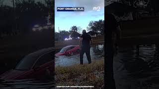 WATCH: Officers rescue man from submerged car in pond after he fell asleep at the wheel
