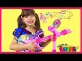 LAURINHA PLAYS WITH DISNEY PRINCESS TOY GUITAR MAGIC AND STARS A BAND