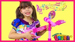 LAURINHA PLAYS WITH DISNEY PRINCESS TOY GUITAR MAGIC AND STARS A BAND
