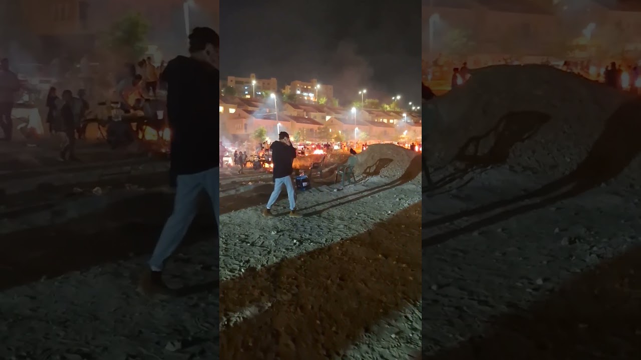 Dancing and singing to Israeli music by bonfire on Lag B'Omer