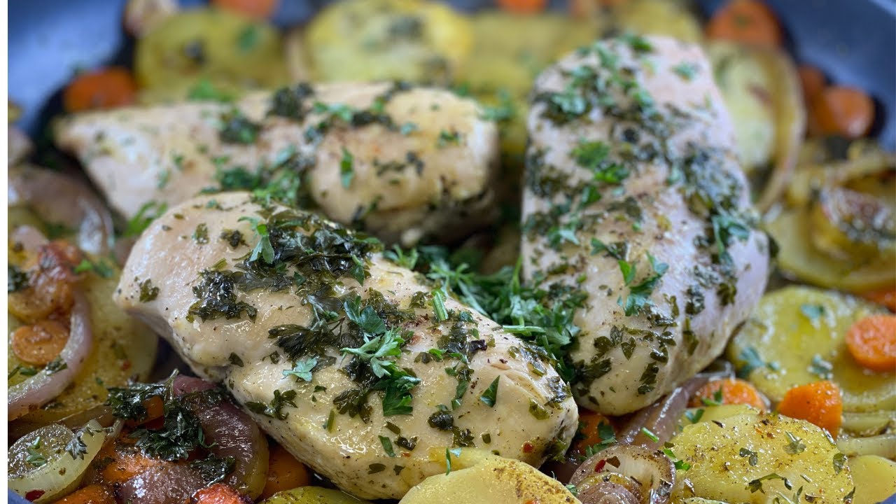 SkilletRoasted Chicken Breasts with potatoes and carrots, one of the