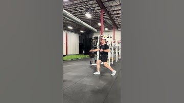 Staggered stance row with rotation
