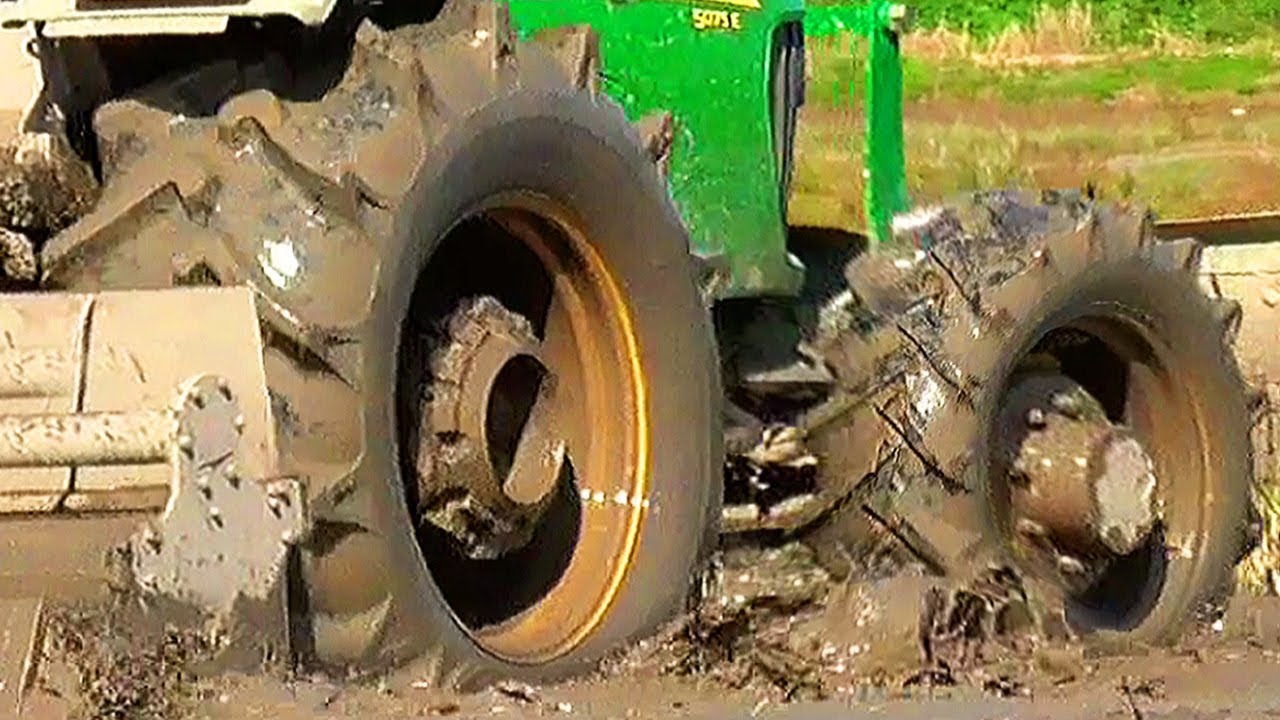 Удивительный трактор John Deere 5075E 4WD в грязи