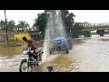 Sonalika 60 Rx Tractor washing in river using motorcycle