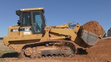 CAT 963C Backfilling and Grading