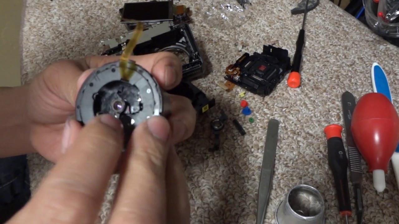 fixing lens problems on a digital camera nikon coolpix s9050 part p03