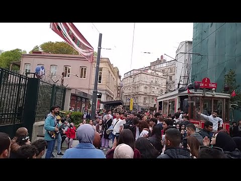 Taksim, independence Street. where singing a Turkish song  when the Tram passes through