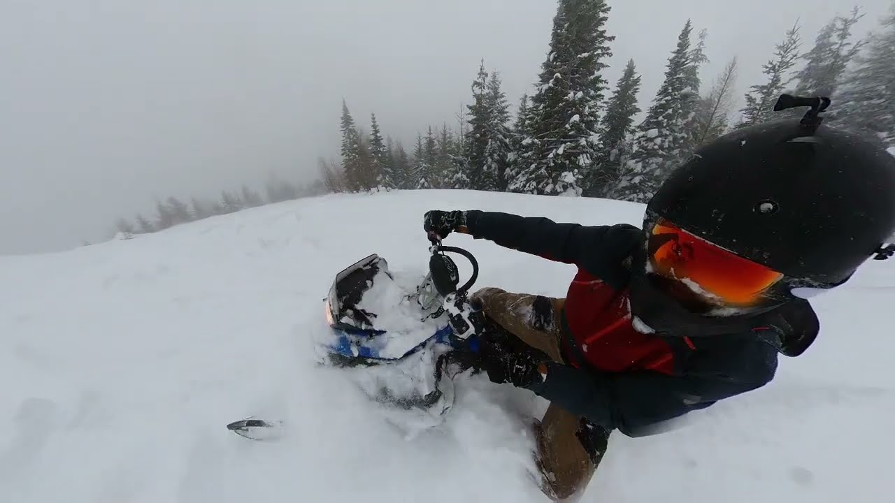Close call on snowmobile