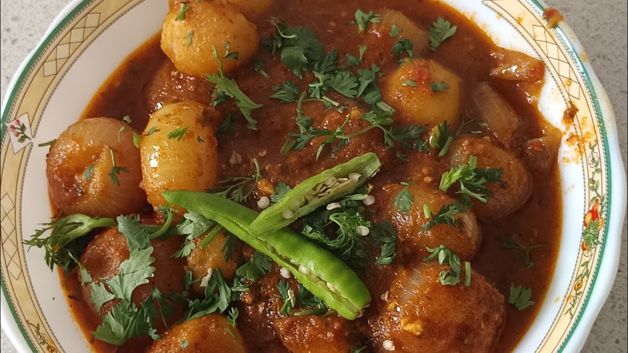 Aloo pyaz ki sabji in tomatoes gravy