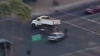 Dump Truck Pursuit Ends In Rollover Wreck (3/21/2002)