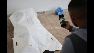 Israel returns bodies of 15 Palestinians after militants return remains of an Israeli hostage