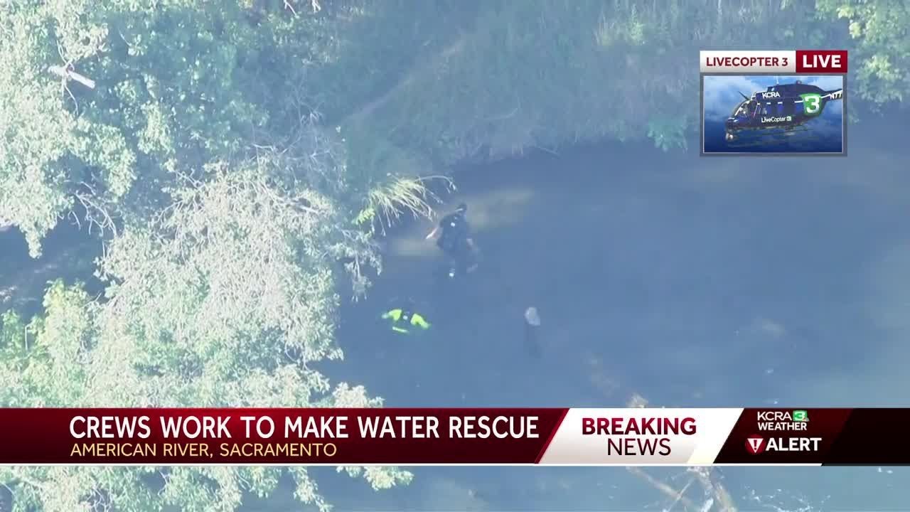 Firefighters rescue two people who were trapped by a tree on American ...