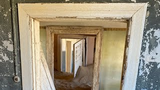 Kolmanskop ghost town Namibia - Biosphere Aura in the kitchen with the candlesticks