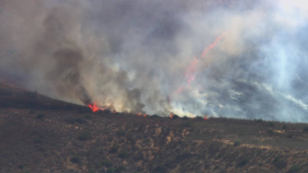 Crews battle brush fire near Shadow Hills - YouTube