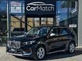 De BMW IX1 xDrive30 in Schwarz II @ CarMatch!
