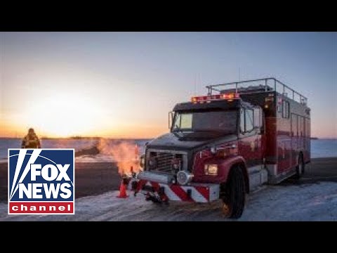 14 killed after bus carrying hockey team collides with truck
