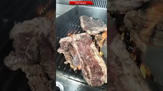 T. bone steak Large baked potatoashed potatoBjack pepper saucesteak STEAK Samucha