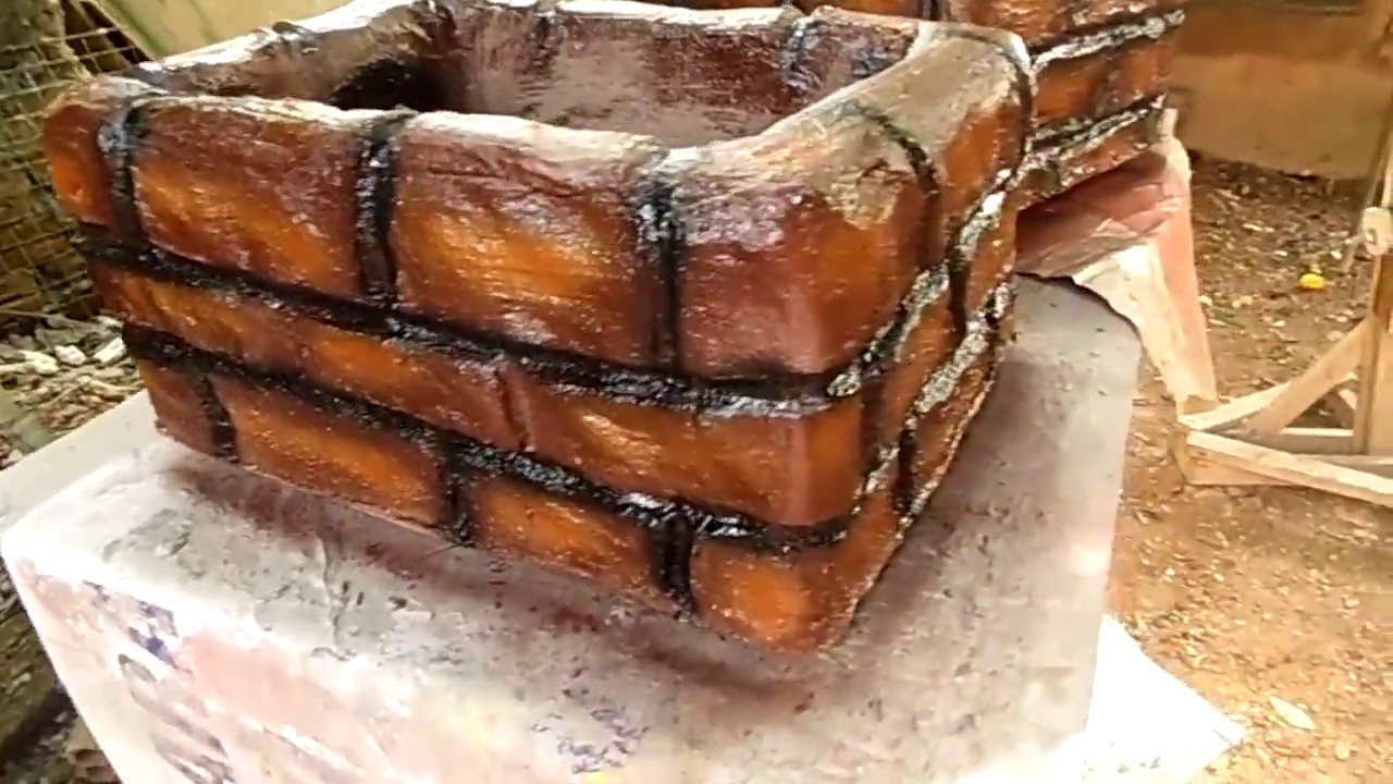 Vasos de isopor e cimento pra Zamioculca